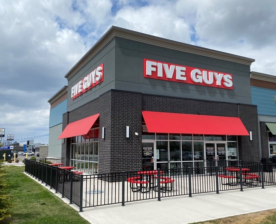 Store front of Five Guys at 650 Division Rd in Windsor, ON.