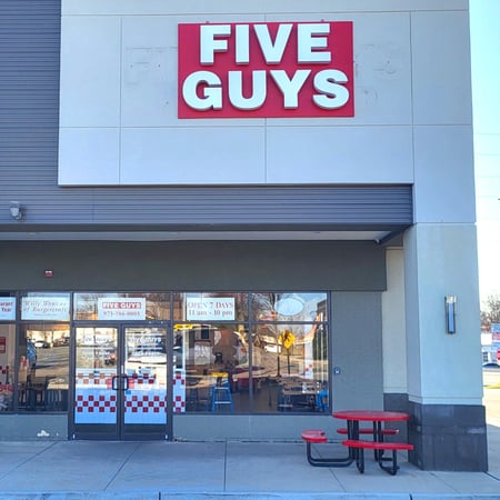 Exterior photograph of the Five Guys restaurant at 240 Route 10 in East Hanover, New Jersey.
