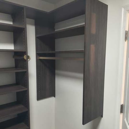 Virginia Beach - Custom closets - Modern dark wood closet with open shelving and hanging rods.
