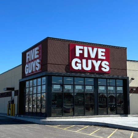 Exterior photograph of the Five Guys restaurant at 870 Leila Avenue in Winnipeg, Manitoba, Canada.