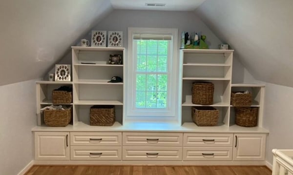 Richmond - Custom closets - Built-in bookshelves on wall with sloped ceiling