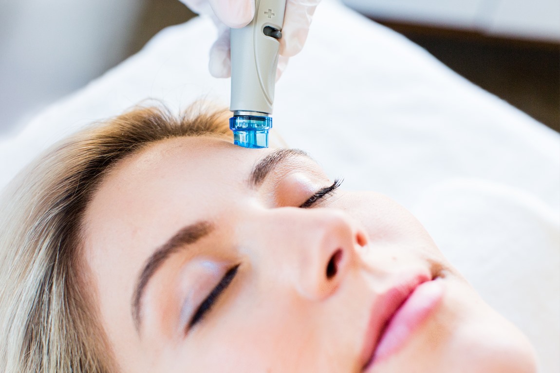 Women getting a HydraFacial at Woodhouse Spa.