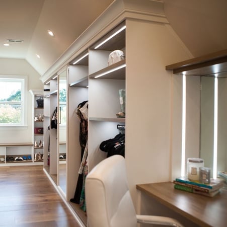 Attic Converted into Dressing Room with Custom Vanity, Accent Lighting, and Shoe Storage/Bench Seating in Milton, Delaware by California Closets of Philadelphia and Delaware