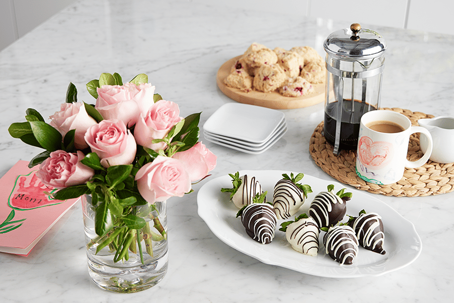 mothers day brunch with coffee pastries and flowers