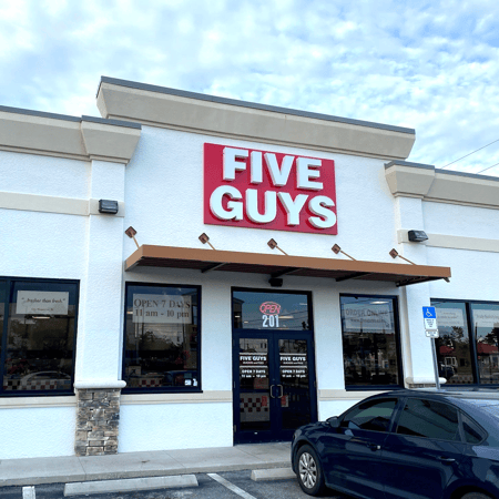 Image of the entrance to the Five Guys restaurant at 12640 South Cleveland Ave. in Fort Myers, Florida.