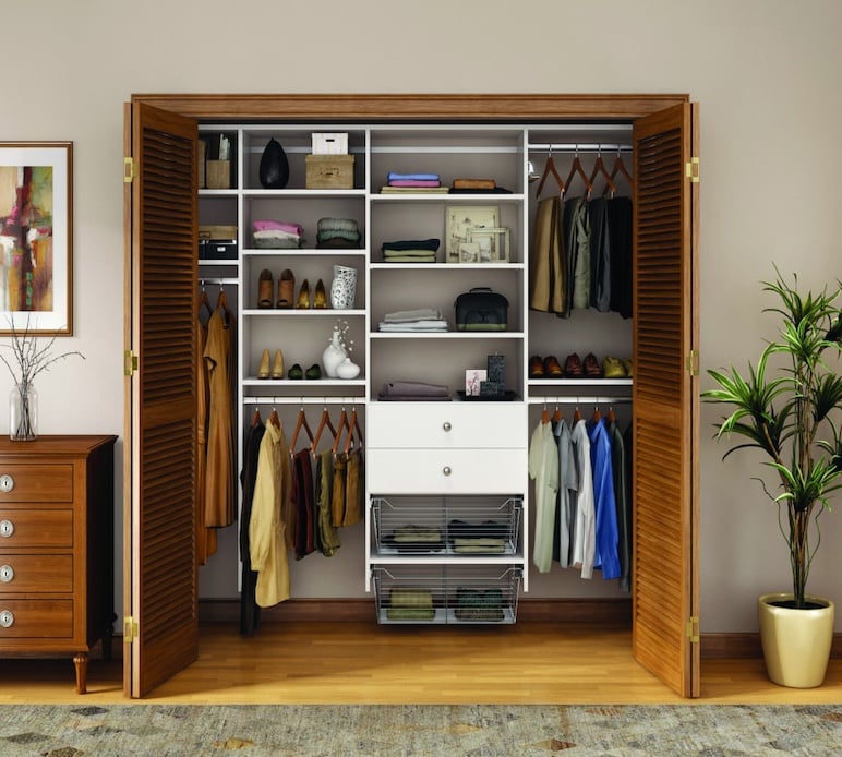 reach in closet with hanging space and drawers for organizing coats and accessories