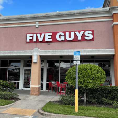 Entrance to the Five Guys restaurant at 2185 SE Federal Hwy in Stuart, Florida.