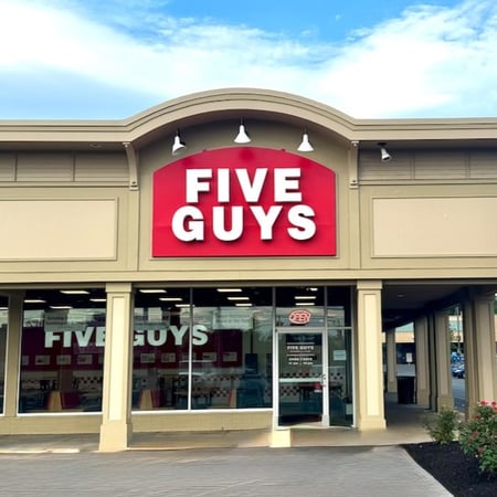 Exterior photograph of the Five Guys restaurant at 900 Central Avenue in Albany, New York.