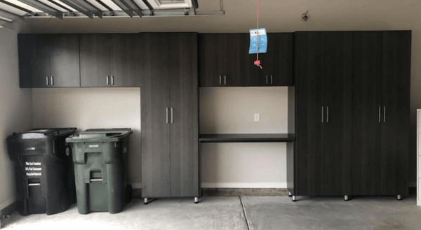 Shadow black garage system with trash can storage