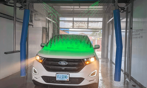 Small SUV being washed by Conserve Car Wash Touchless Wash in North Conway, NH