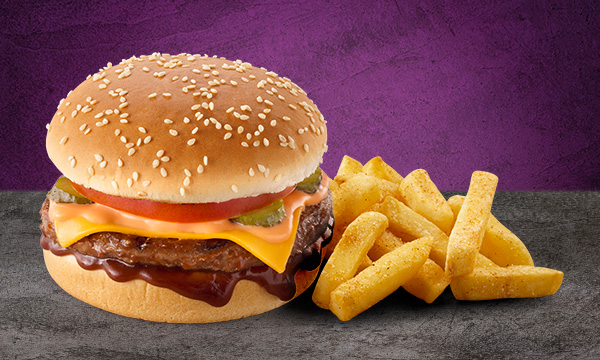 Classic Cheese Burger on a grey surface with a grey background.