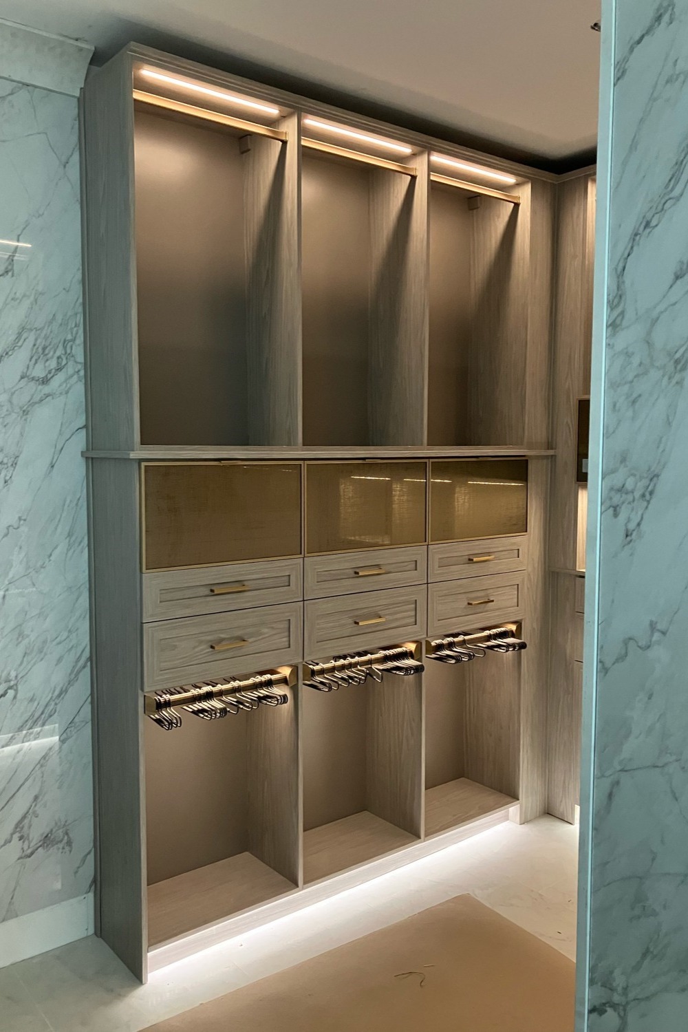 Walk-in closet with lighting California Closets Pensacola and Panama City, Florida