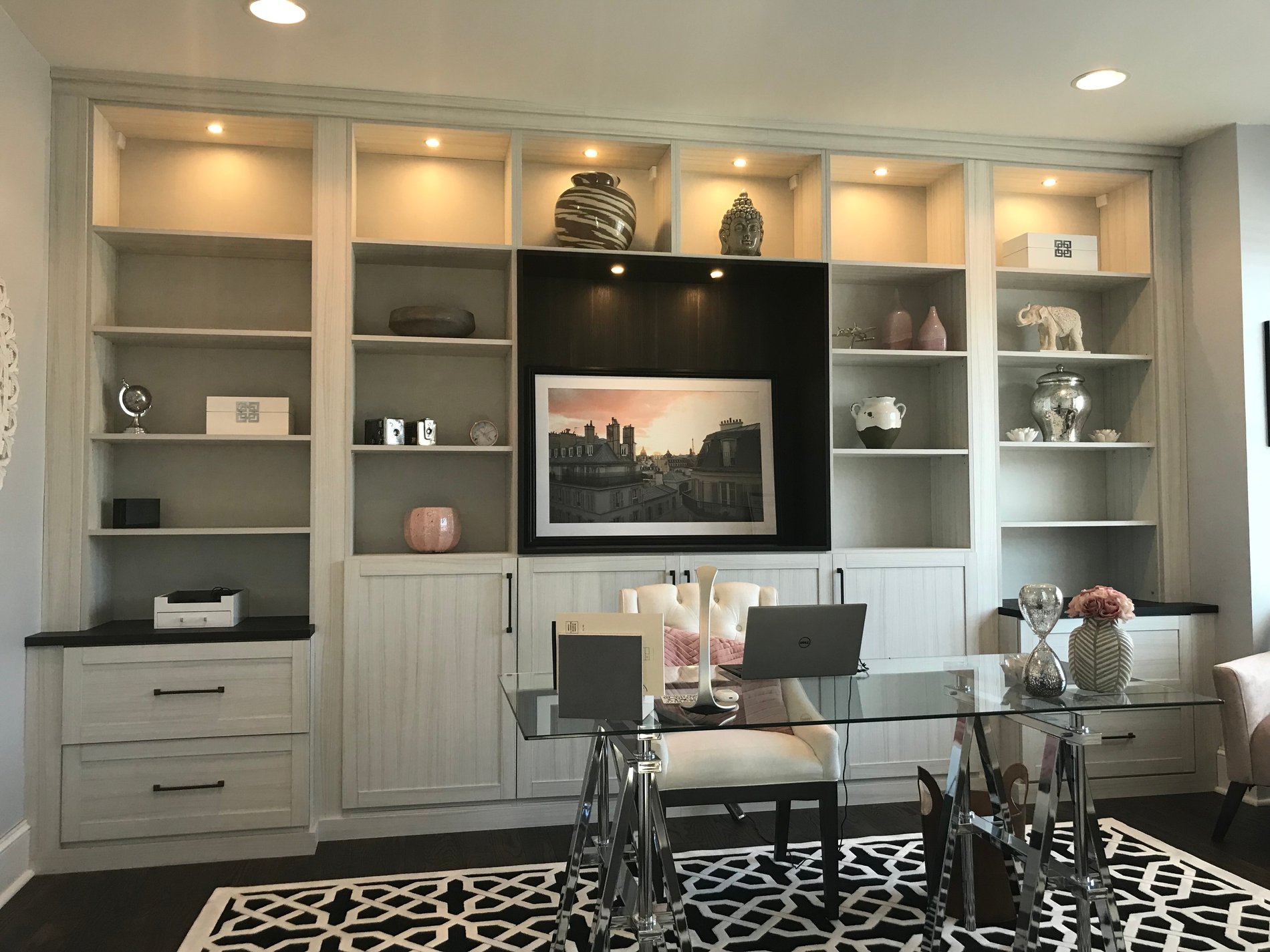 Home office bookshelves and cabinets with desk in a shade of white