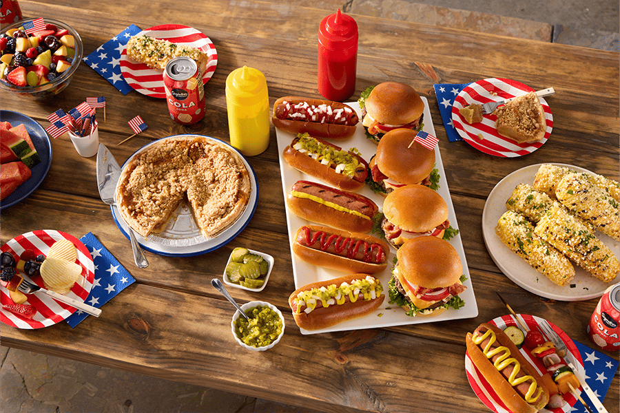 hamburgers hot dogs desserts and grilled vegetables for memorial day