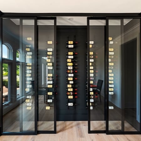 Dark tone wine bar with metal framed glass doors