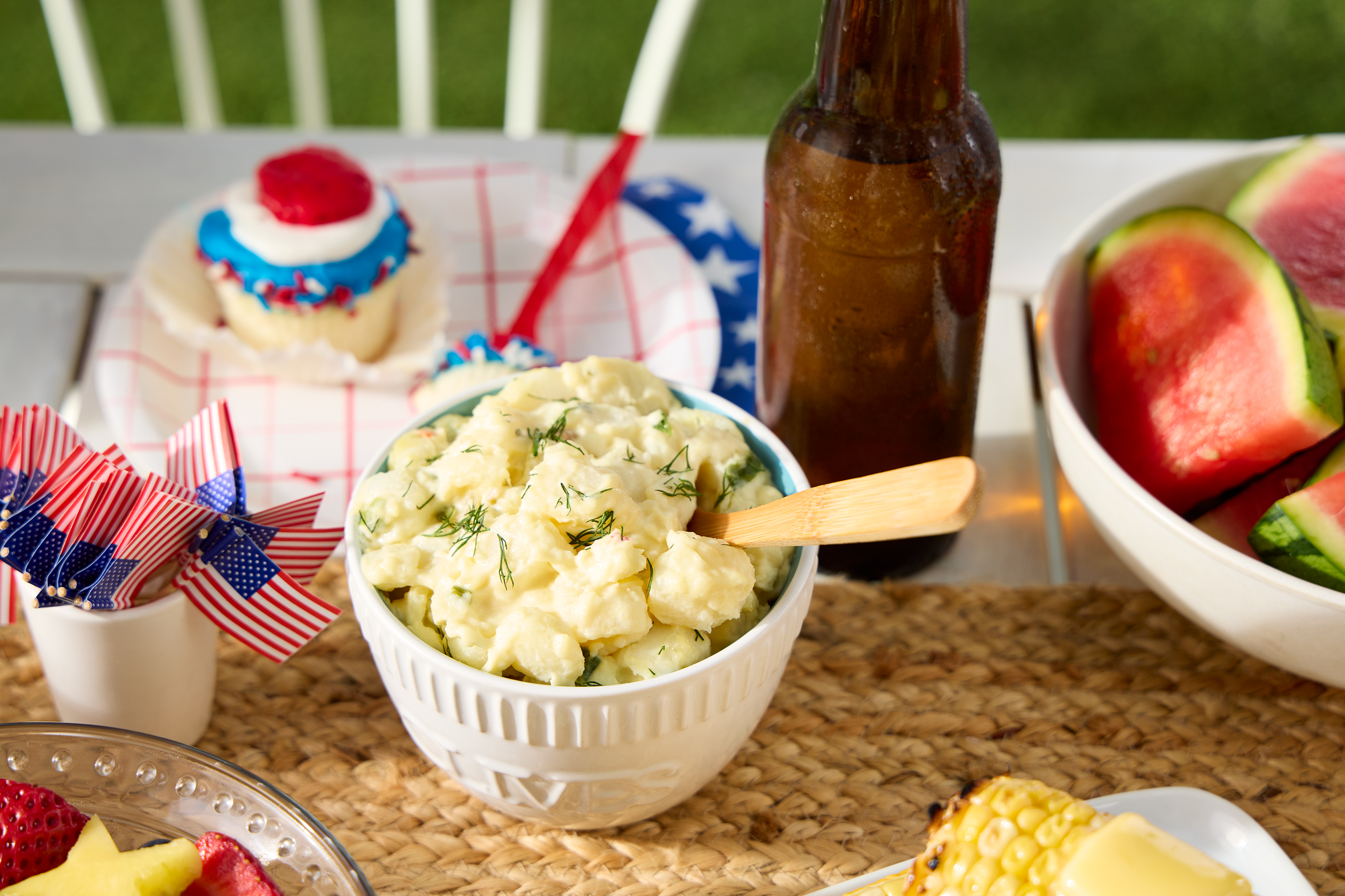 potato salad and sides at a fourth of july barbeque