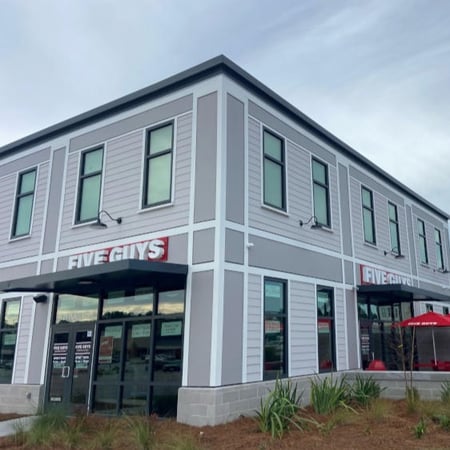 Exterior photograph of the Five Guys restaurant at 29 Robert Smalls Parkway in Beaufort, South Carolina.