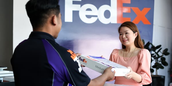 FedEx employee, package and customer