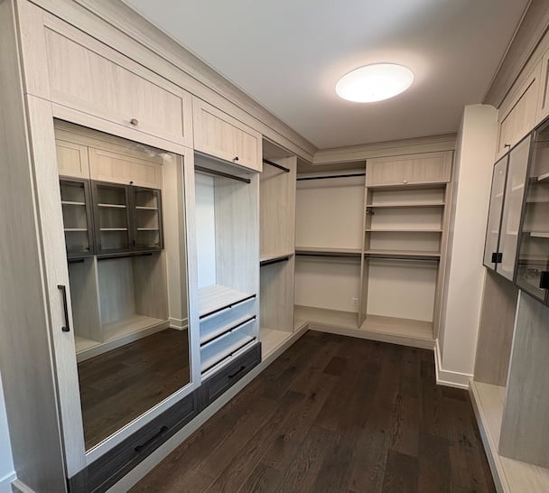 custom walk in closet with drawers, and hanging space