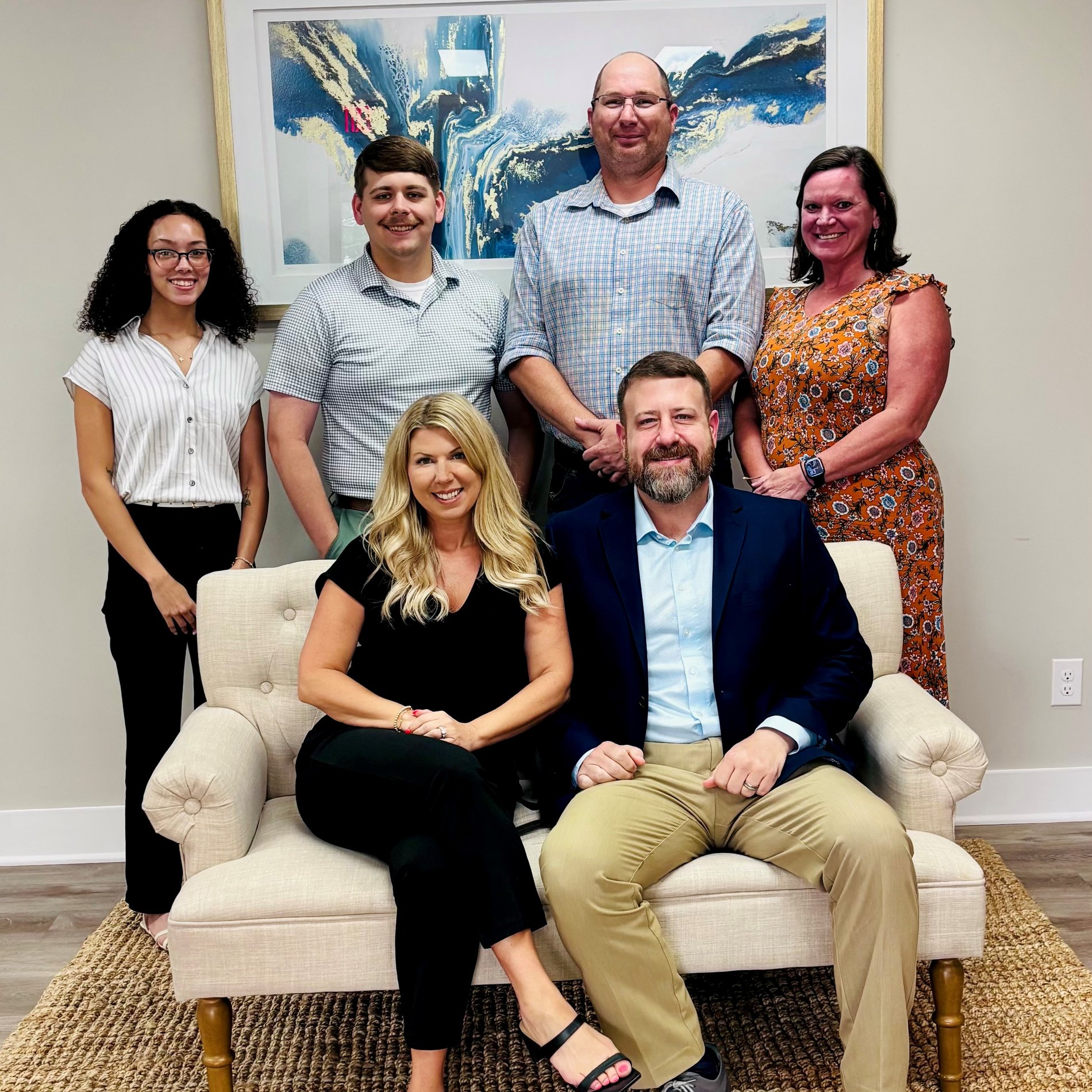 Taken on our first day in our new office. A team ready to serve!