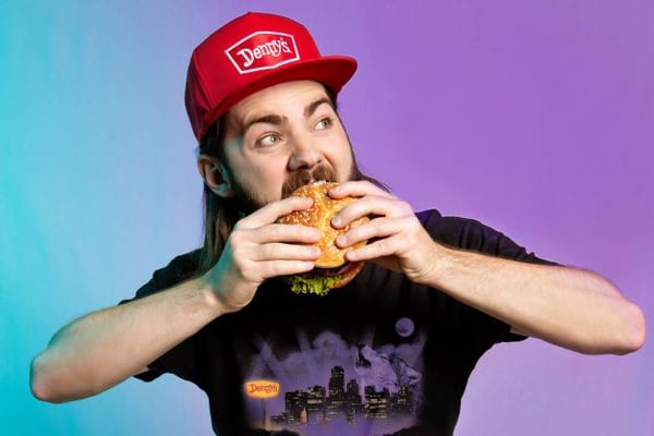 Male eating a burger