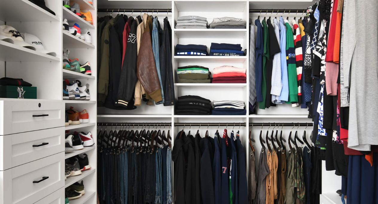 traditional farmhouse style white full room walk-in closet with double hanging, shoe wall storage, drawers, and shelving Scarsdale NY