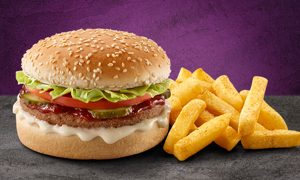 Steers® Plant-Based Veggie meal on a grey surface with a grey background.