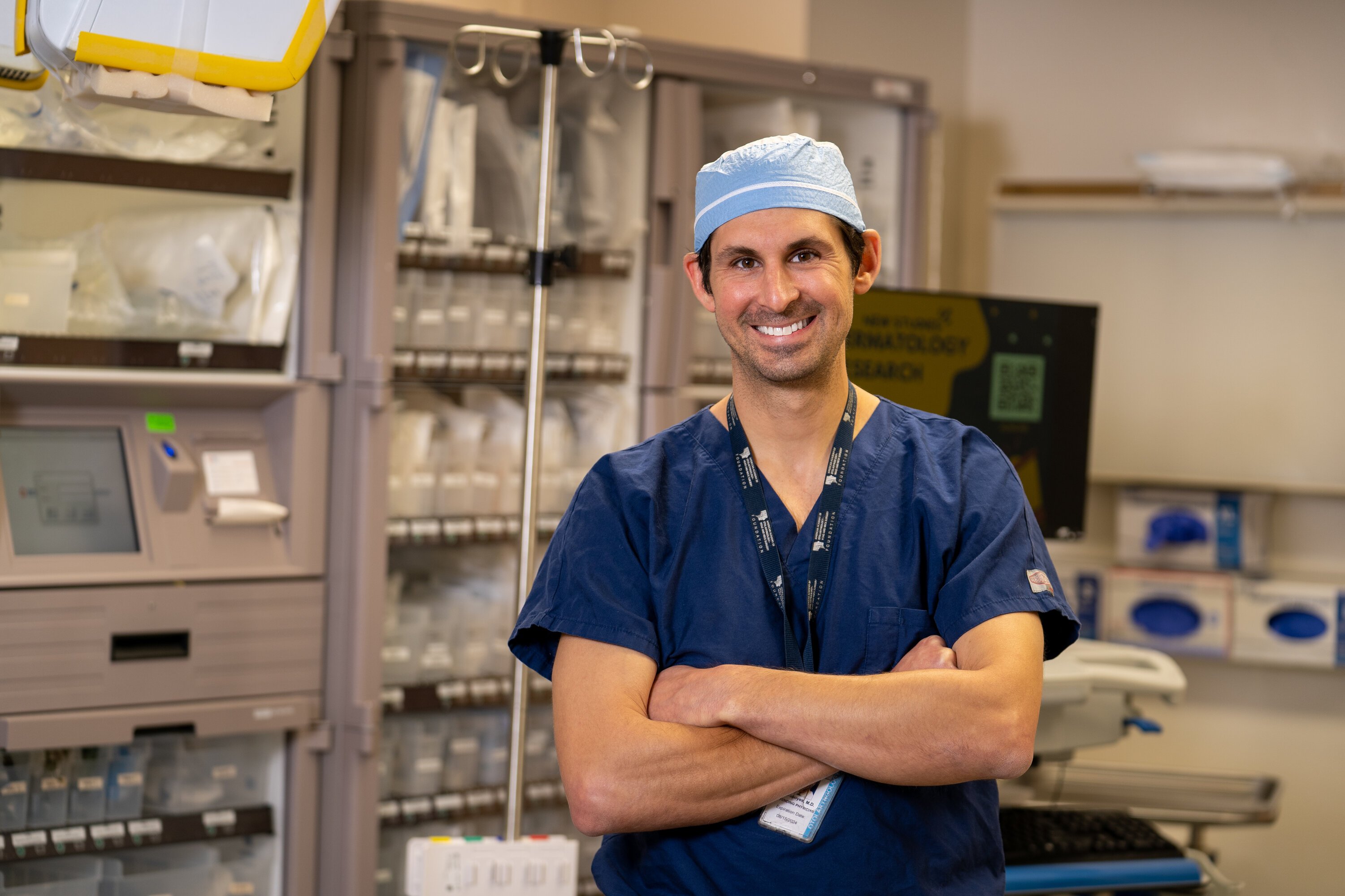 Dr. Evan Graboyes in scrubs.