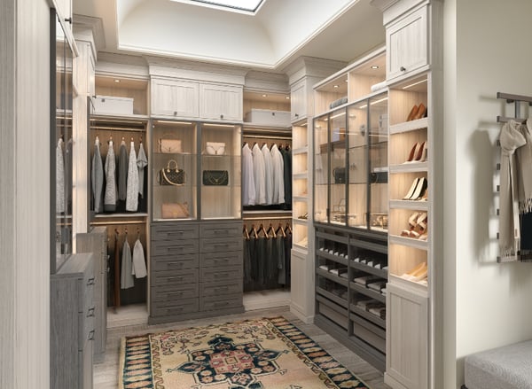 Custom Walk-In Closet CC Luxe Matte Morning Light Finish Boutique Style Dressing Room Slanted Shoe Shelves Built-In Vanity Drawer Storage Mirrored Cabinet Doors Ribbon Shelf Lighting Crown Molding Luxury Closet Design by California Closets South Palm Beach Florida