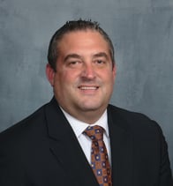 A headshot image of Matthew Malone.