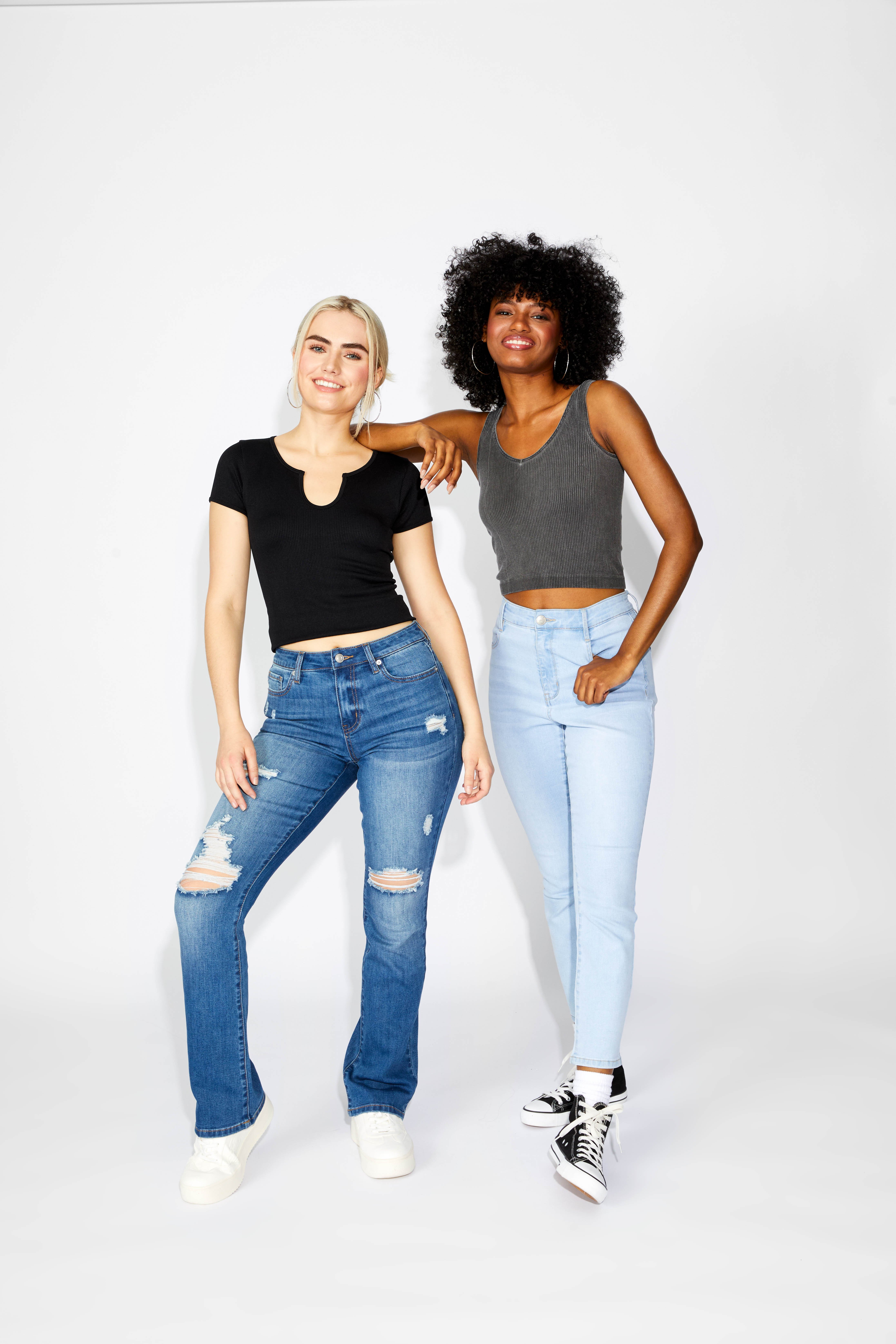 Two female models wearing jeans and crop tops from rue21
