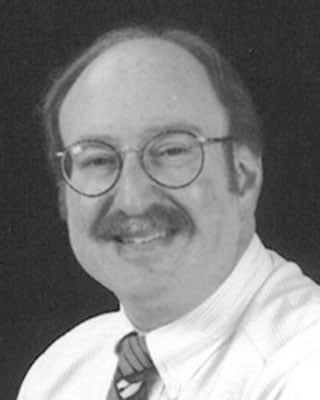 Headshot of Howard A. Schneider, MD
