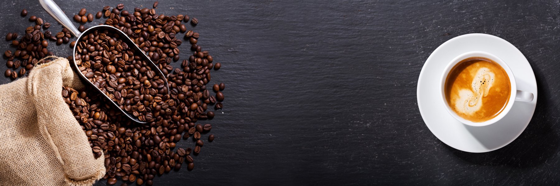 ground coffee and a cup of coffee