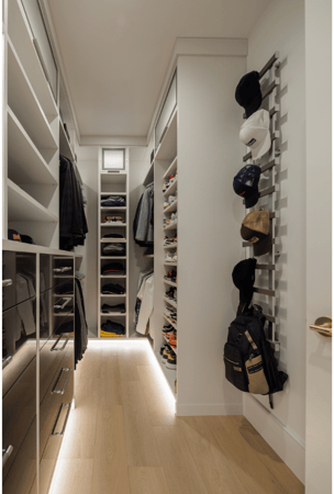 California Closets New City Rockland County NY Custom Men's Walk in Closet High Gloss Black Drawer Fronts Custom Maddox Hanging System for Accessories Hanging Shelving and Custom Drawer Space LED Lighting