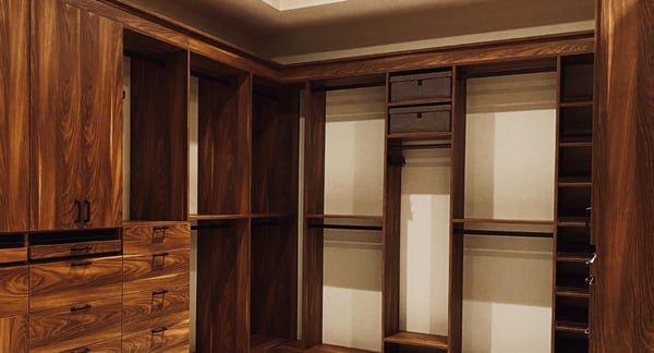 Walk-in closet in brown finish