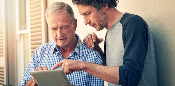 Man tries to convince his father to try hearing aids from AudioNova.