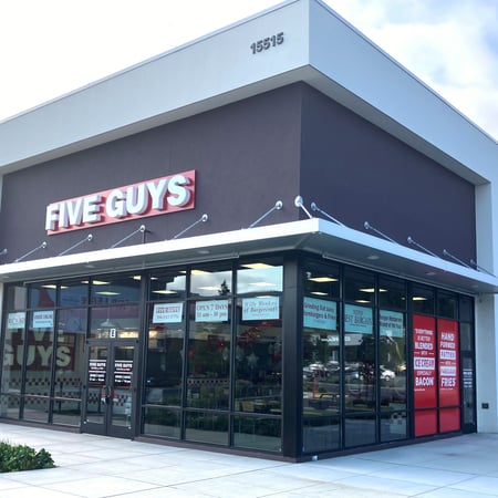 Exterior photograph of the Five Guys restaurant at 15515 Westminster Way in Shoreline, Washington.