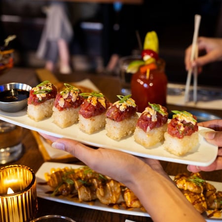 Ahi Pressed Sushi plate being passed