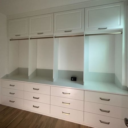 Greensboro - Custom closets - white walk-in closet with racks for clothing and drawers