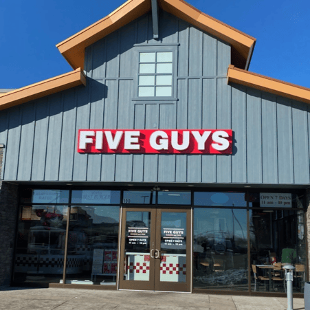 Exterior photograph of the Five Guys restaurant at 2934 Arapahoe Road in Erie, Colorado.
