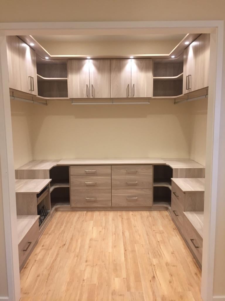 Custom home office and office storage by California Closets Hawaii.