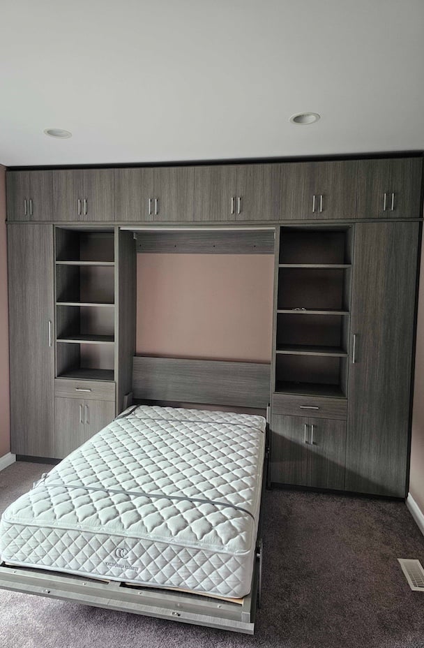 Wall bed with shelving and drawers