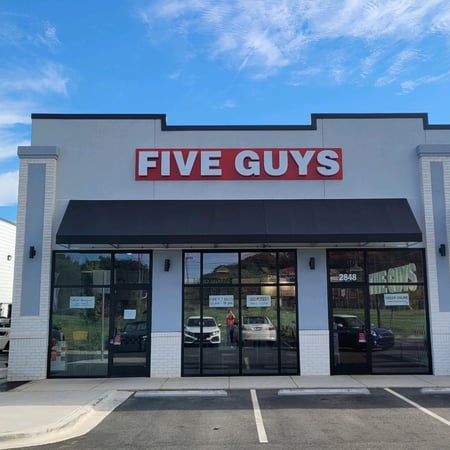 Entrance to the Five Guys restaurant at 2848 Highway 74 West in Monroe, North Carolina.