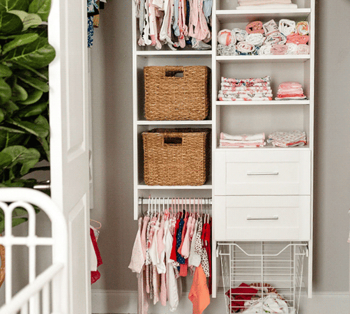 Nursery reach in closet with bins and wire baskets