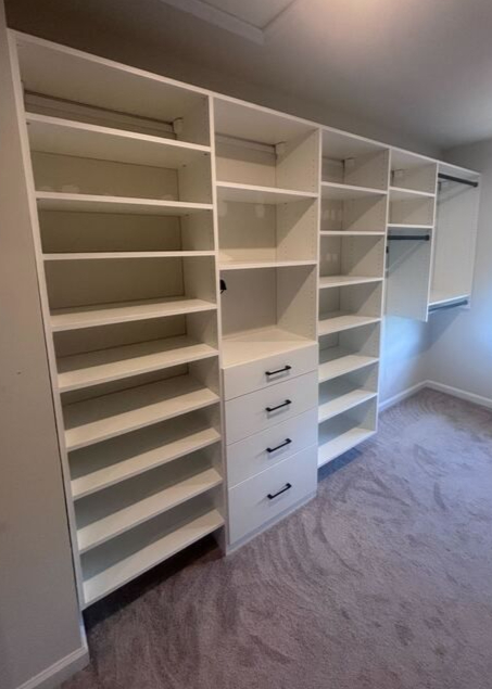 Virginia Beach - Custom closets - Walk-in closet with dual hanging rods and open shelving in neutral tones.