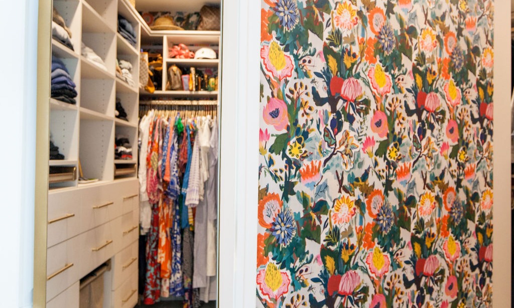 Custom Walk-in Closet with Pull-out Hampers and Ample Shoe Storage