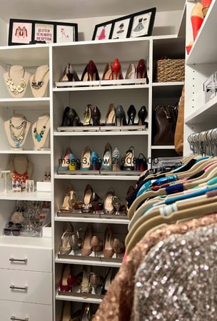 A smaller walk-in with style by California Closets Charlotte, North Carolina.