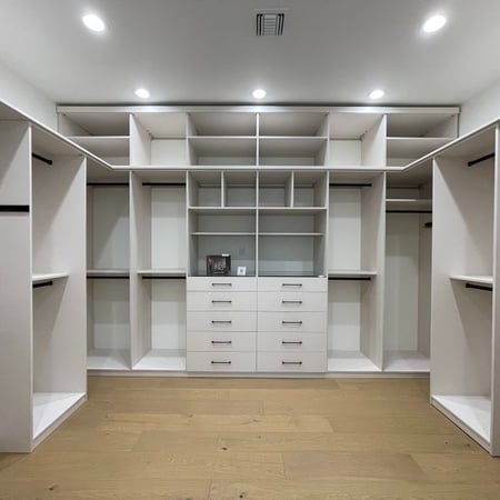 Custom closet organization closet with drawers and shelving California Closets New Orleans & Gulf Coast