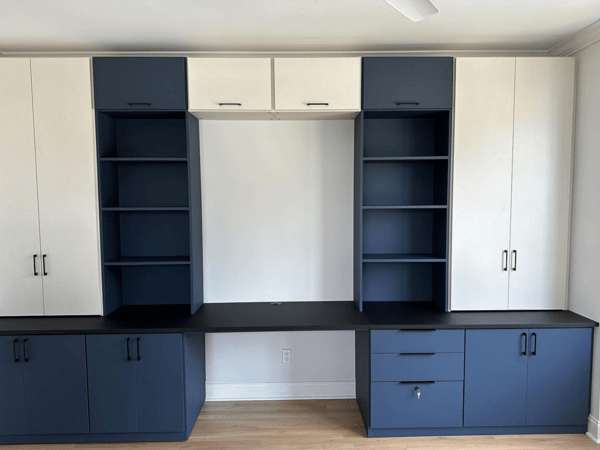 White and blue office desk with shelves and cabinets