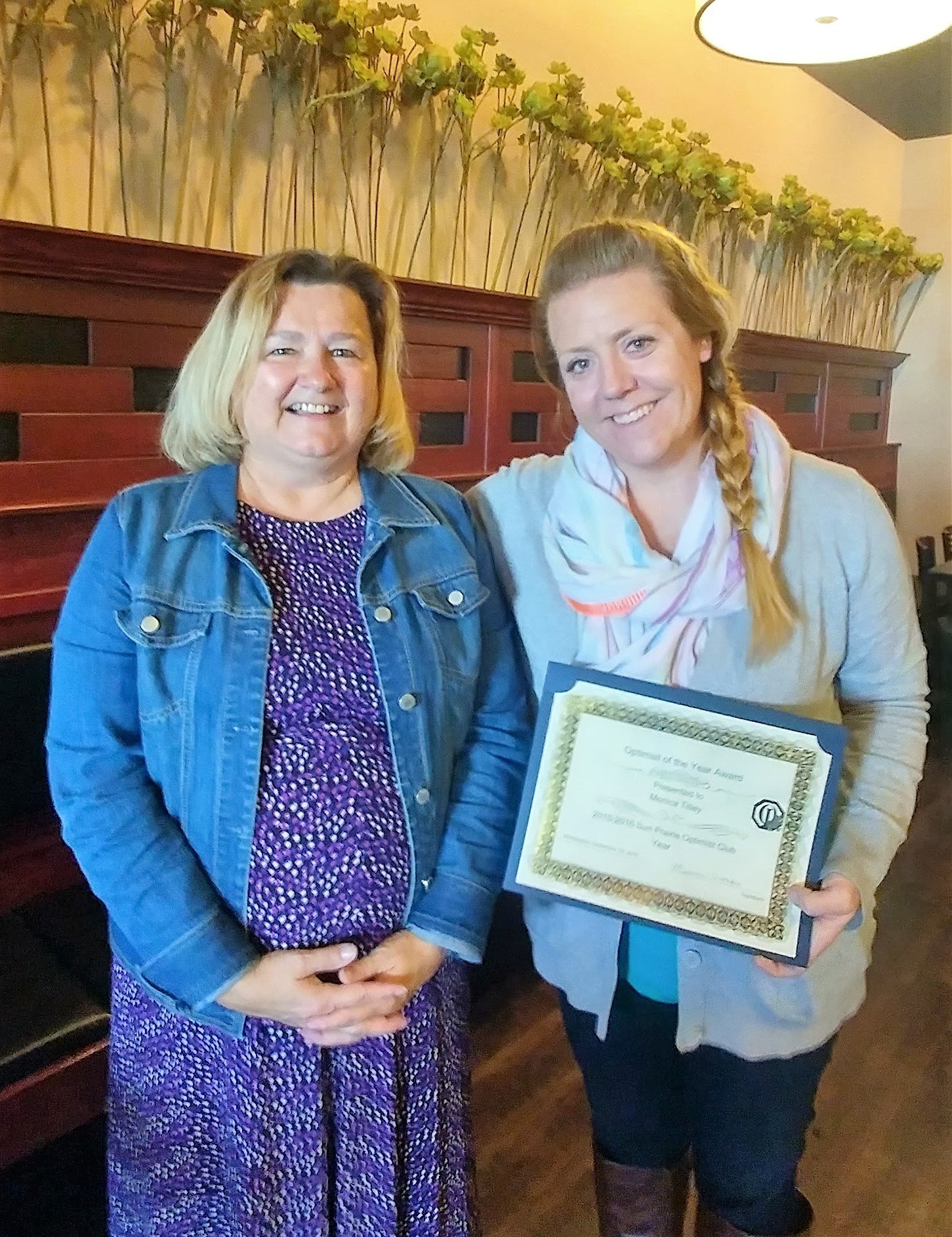 Monica receives another award from the Sun Prairie Optimist Club.